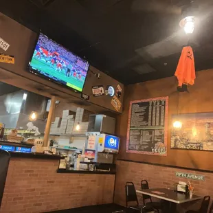 a view of a television and a bar