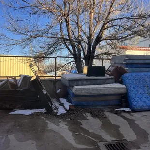 Our view. Discarded furniture and mattresses.