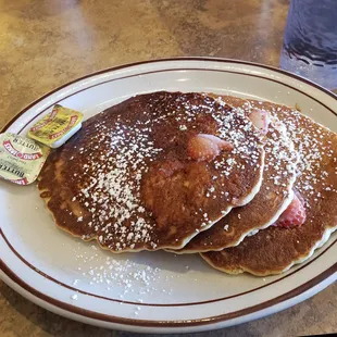 Strawberry pancakes cost $5.30