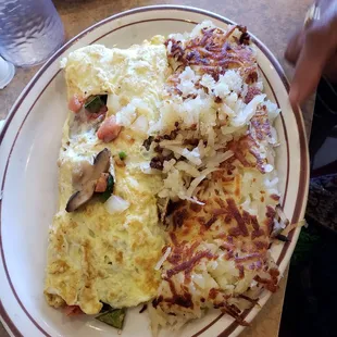Veggie omelet with hashbrowns  and toast coats $5.99