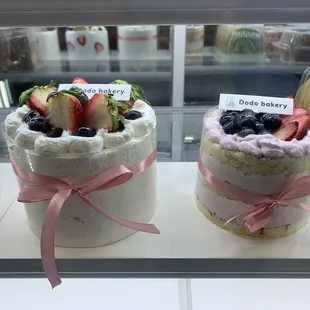 a variety of cakes on display