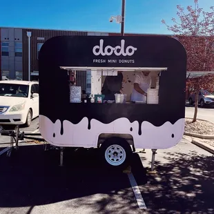 a black and white food truck