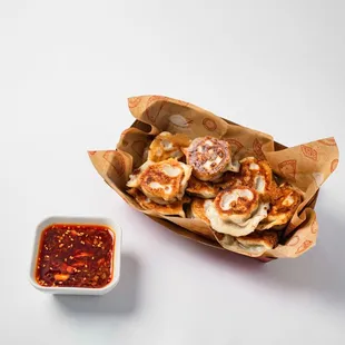 Crispy pan fried soup dumplings with the most tastiest dipping sauce