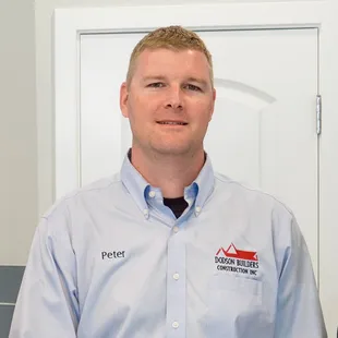 a man standing in front of a door