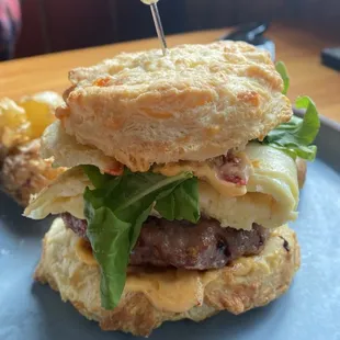 Breakfast sandwich with house-made sausage and the best chili aioli you&apos;ll ever have.