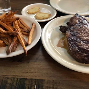 Delicious Ribeye steak and fries