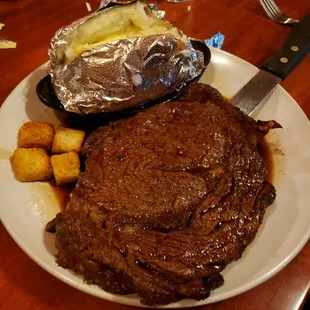 Steak and baked potato.