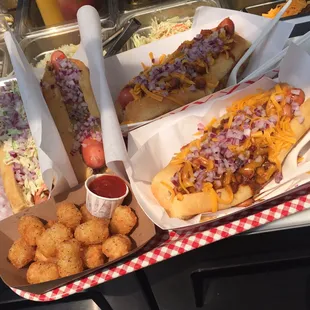 What a spread! Chili Dogs, Basic Dog, Slaw Dog and Tater Tots with spicy ketchup.