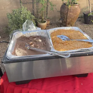 two trays of food on a table
