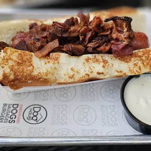 sausage smothered in smoked bacon