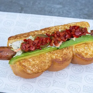 T-MEX – beef chorizo &amp; pepper jack sausage, avocado, chipotle aioli, haus slaw, pickled jalapeños, pickled peppers