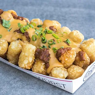 CHILI CHEESE FRIES OR TOTS