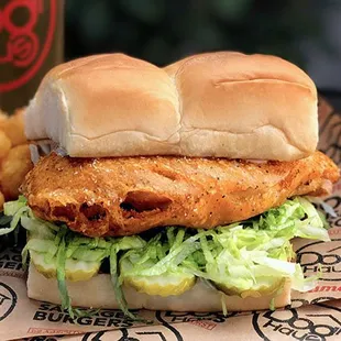 BAD MUTHA CLUCKA CHICKEN SANDWHICH - beer battered or grilled chicken breast, lettuce, pickles, miso ranch