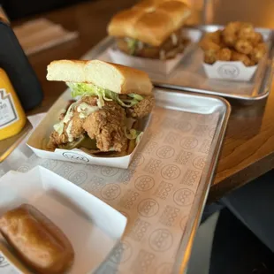 two trays of food on a table