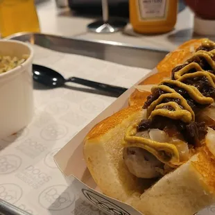 a hot dog with mustard and ketchup
