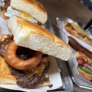 a hamburger and onion rings