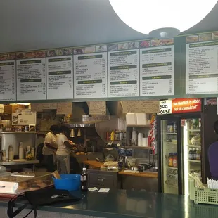 customers at the counter of a restaurant