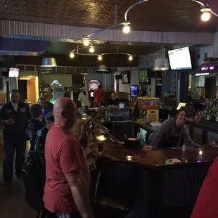 people sitting at the bar