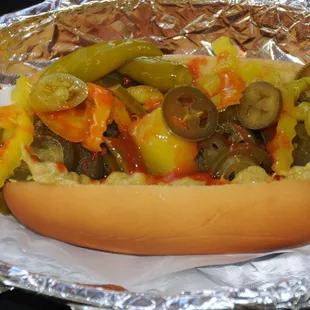 Die slow dog: jalapeño's, sport &amp; banana peppers, chipotle &amp; habanero mayo, super spicy!