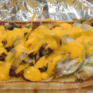 1/2 lb Philly cheese steak sandwich on 8" Potato roll!