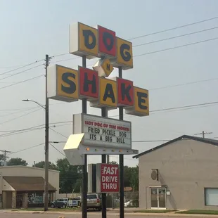 shows a dog - n - shake sign