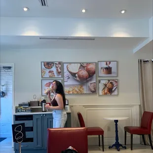 a woman standing in the kitchen