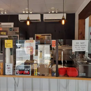 a view of the counter area of a restaurant