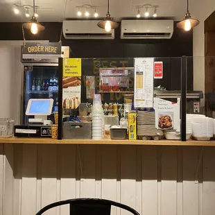 a view of the counter area of a restaurant