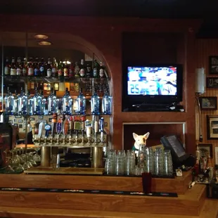 a bar with a television in the background