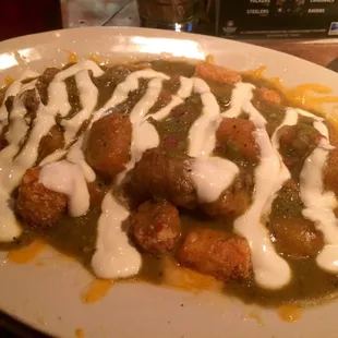 Green Chili Tater Tots... So very good! We boxed our burger to make sure we had room to finish this yumminess!