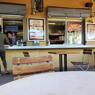 a woman standing at the counter