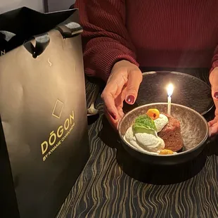 $7 "not complimentary birthday rum cake"