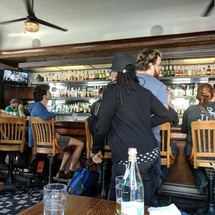 people sitting at the bar