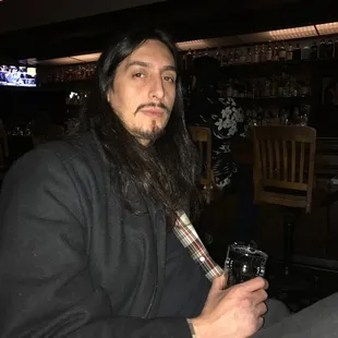 Local artist Anthony Bianconi feeling strong after another drink done.