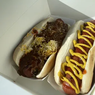 two hotdogs in a box