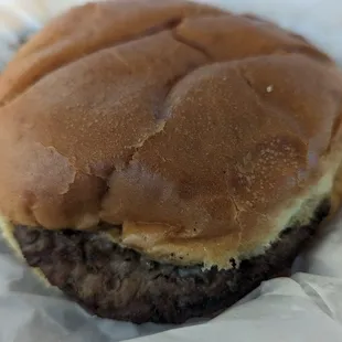 a hamburger in a wrapper