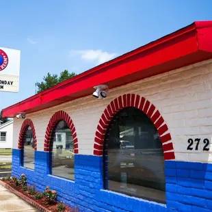 a red, white and blue building