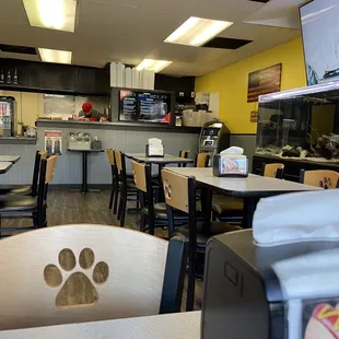 a restaurant with tables and chairs