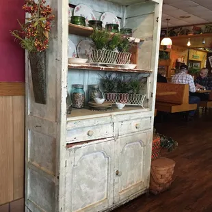 an old white china cabinet