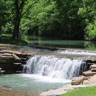 a waterfall in the park
