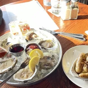 1/2 Dozen raw chef select oysters. Horesradish/Tobasco/Lemons yum. Braised fingerling potatoes.