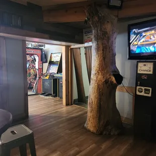 a game room with arcade machines