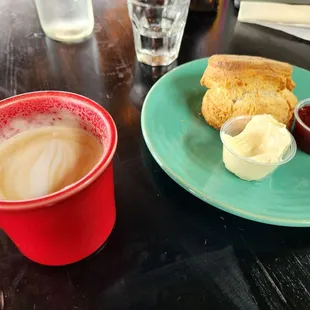 Vanilla latte (yum) and biscuit with butter and jam (must try)