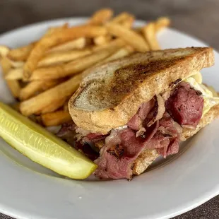 a corned beef sandwich and fries