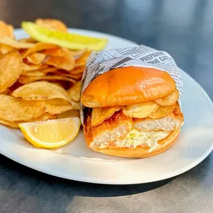 fish sandwich with potato chips