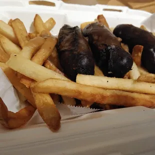 Bangers &amp; Chips: Irish Sausages topped with a Savory Brown Gravy, served over Hot and Crispy Fries