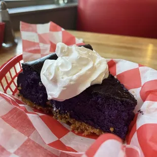 a slice of blueberry cheesecake