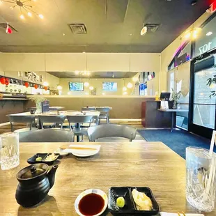 a view of a restaurant with a table and chairs