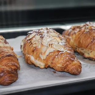 three croissants on a tray