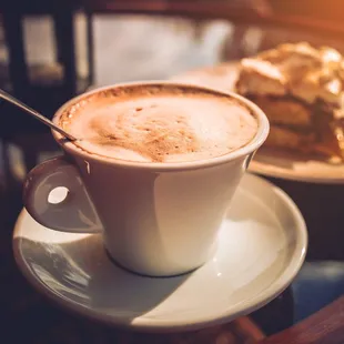 a piece of cake and a cup of coffee